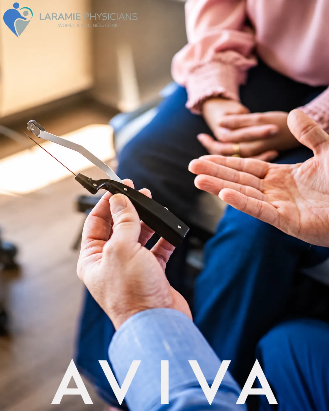 An LPWWC clinician holding the Aviva radiofrequency handpiece